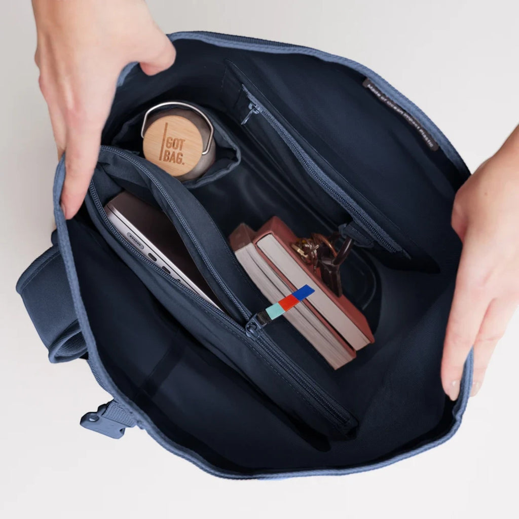 Lieblingstasche GOT BAG Rolltop Lite 2.0 backpack interior showing laptop sleeve, water bottle, and organized pockets