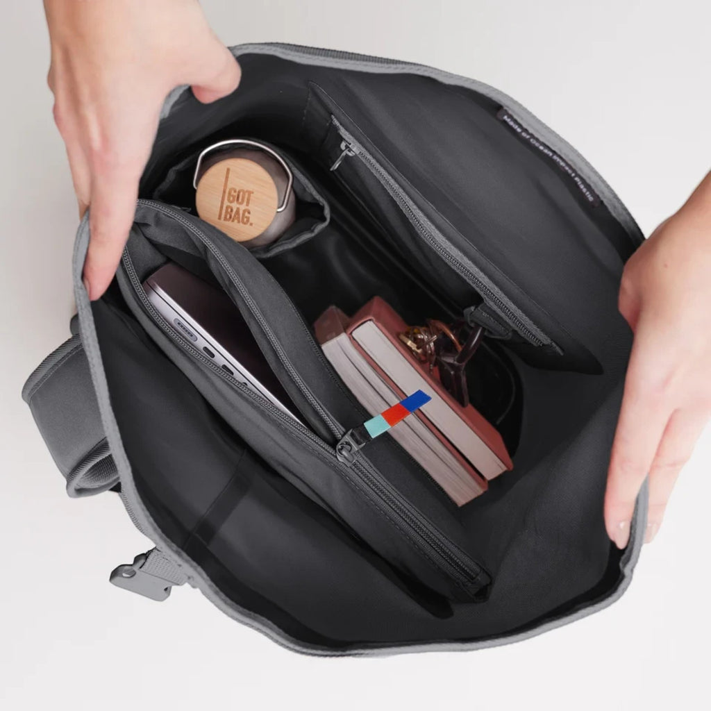 Lieblingstasche GOT BAG Rolltop Lite 2.0 backpack interior showing laptop sleeve, water bottle, and organized pockets