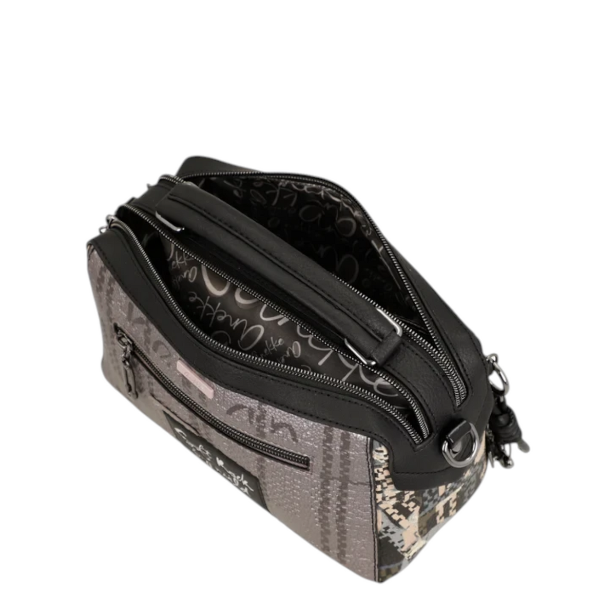 Lieblingstasche cross-body bag featuring a grey patterned exterior with black trim and a printed interior lining
