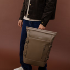 Lieblingstasche Helsinki Pro backpack in taupe, featuring a roll-top design and side compression straps.