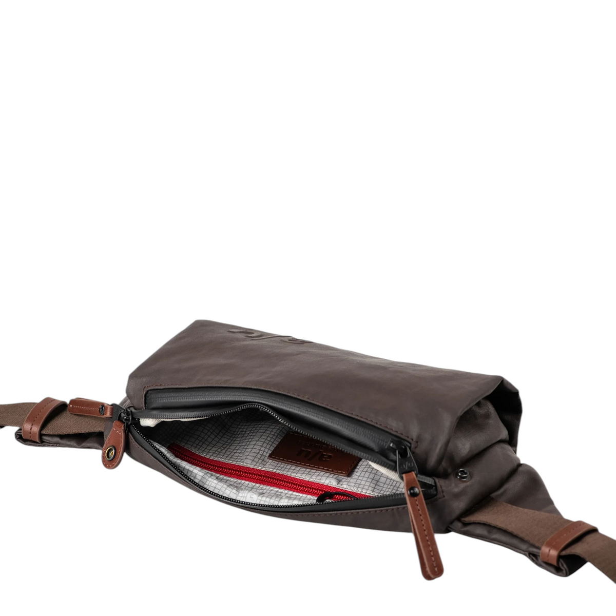 Lieblingstasche Himeji brown waist bag with open zipper, interior grid lining, and brown leather accents