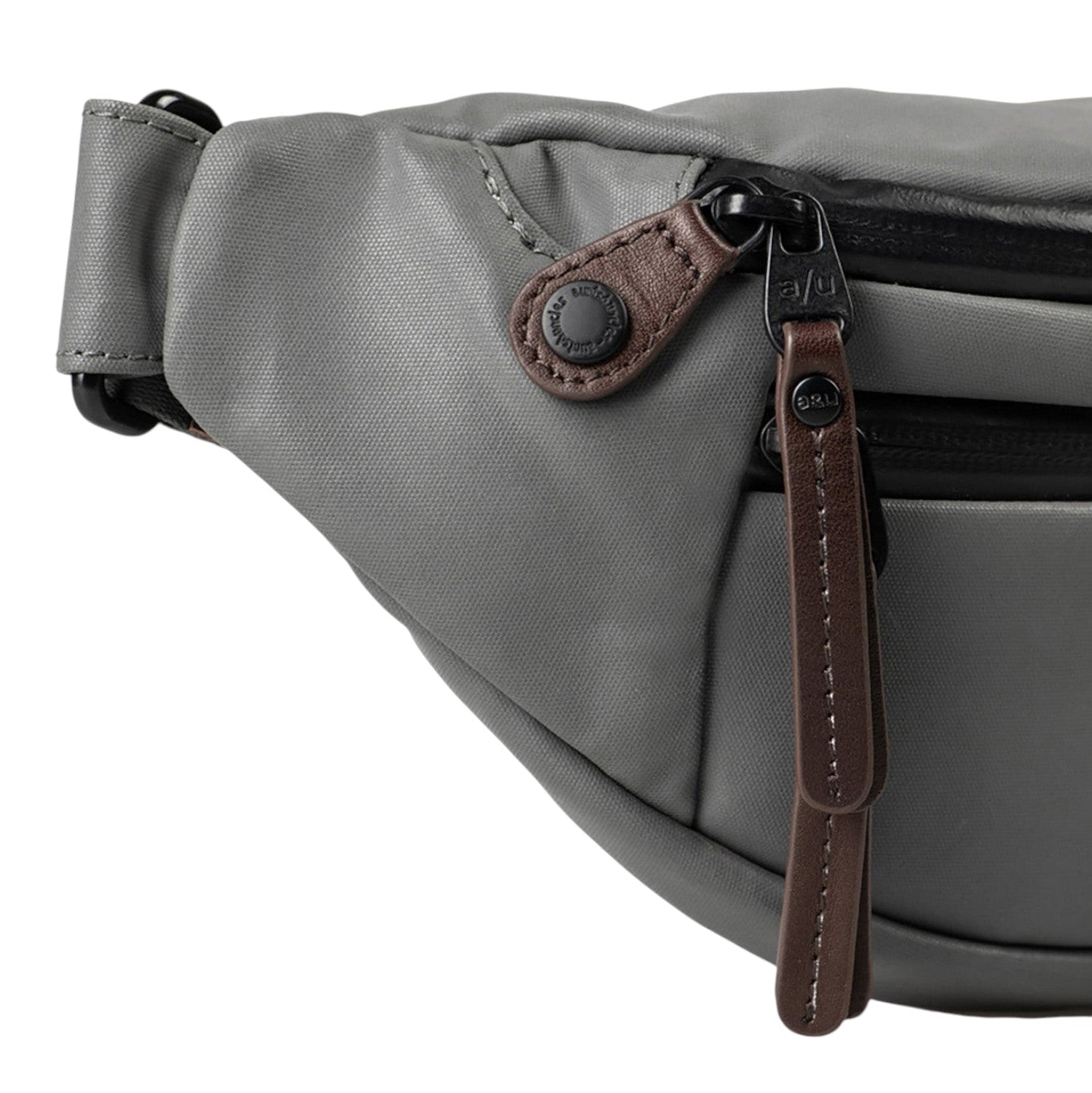 Lieblingstasche a/u by aunts & uncles Ichikawa grey belt bag with water-repellent zippers and brown leather details