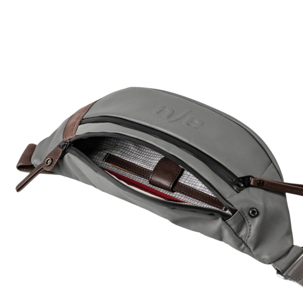 Lieblingstasche a/u by aunts & uncles Ichikawa grey belt bag with brown leather details and open main compartment