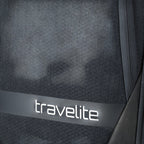 Close-up of the dark grey textured fabric on a Lieblingstasche KICK OFF trolley suitcase with travelite branding.