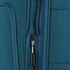 Close-up of the Lieblingstasche KICK OFF trolley suitcase in petrol blue featuring durable fabric and zipper detail.