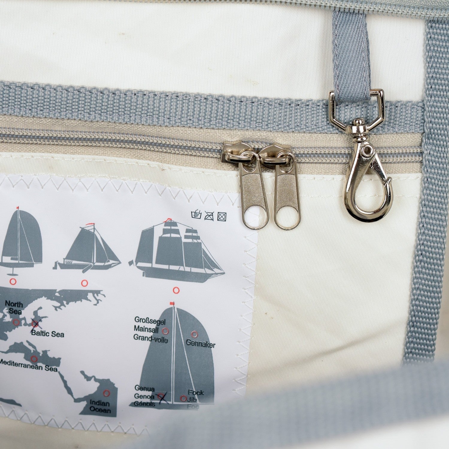 Lieblingstasche Kutter XL bag interior featuring a white sailcloth lining with a nautical map and sail type print.