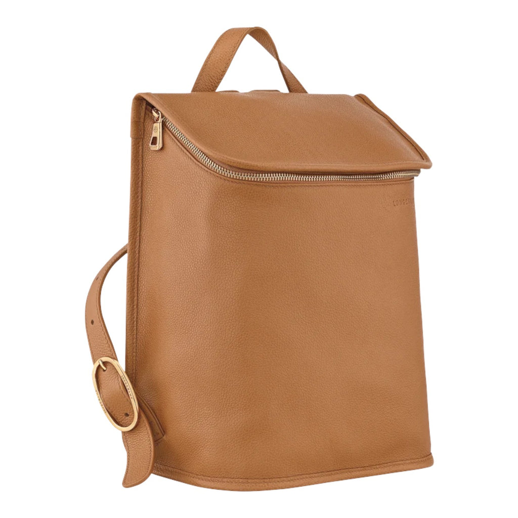 Lieblingstasche Le Foulonné rucksack in tan pebbled leather with gold hardware and adjustable strap.