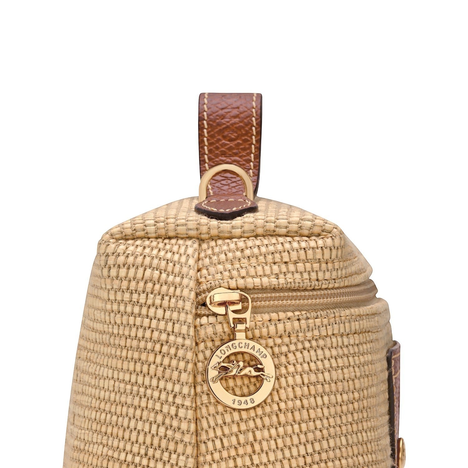 Lieblingstasche Le Panier Pliage XS straw crossbody bag with brown leather trim and gold hardware.