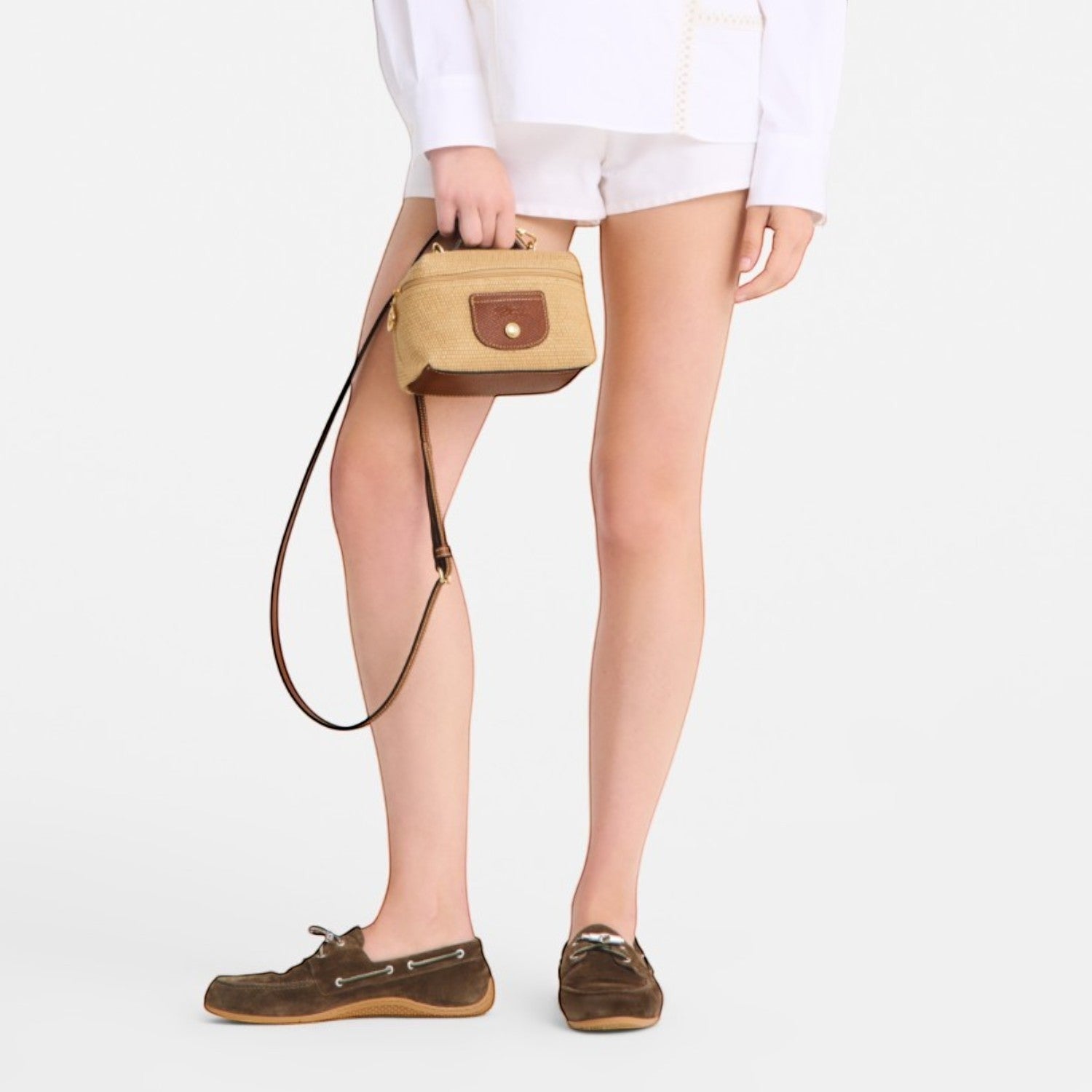 Lieblingstasche Le Panier Pliage XS straw crossbody bag with brown leather trim and strap