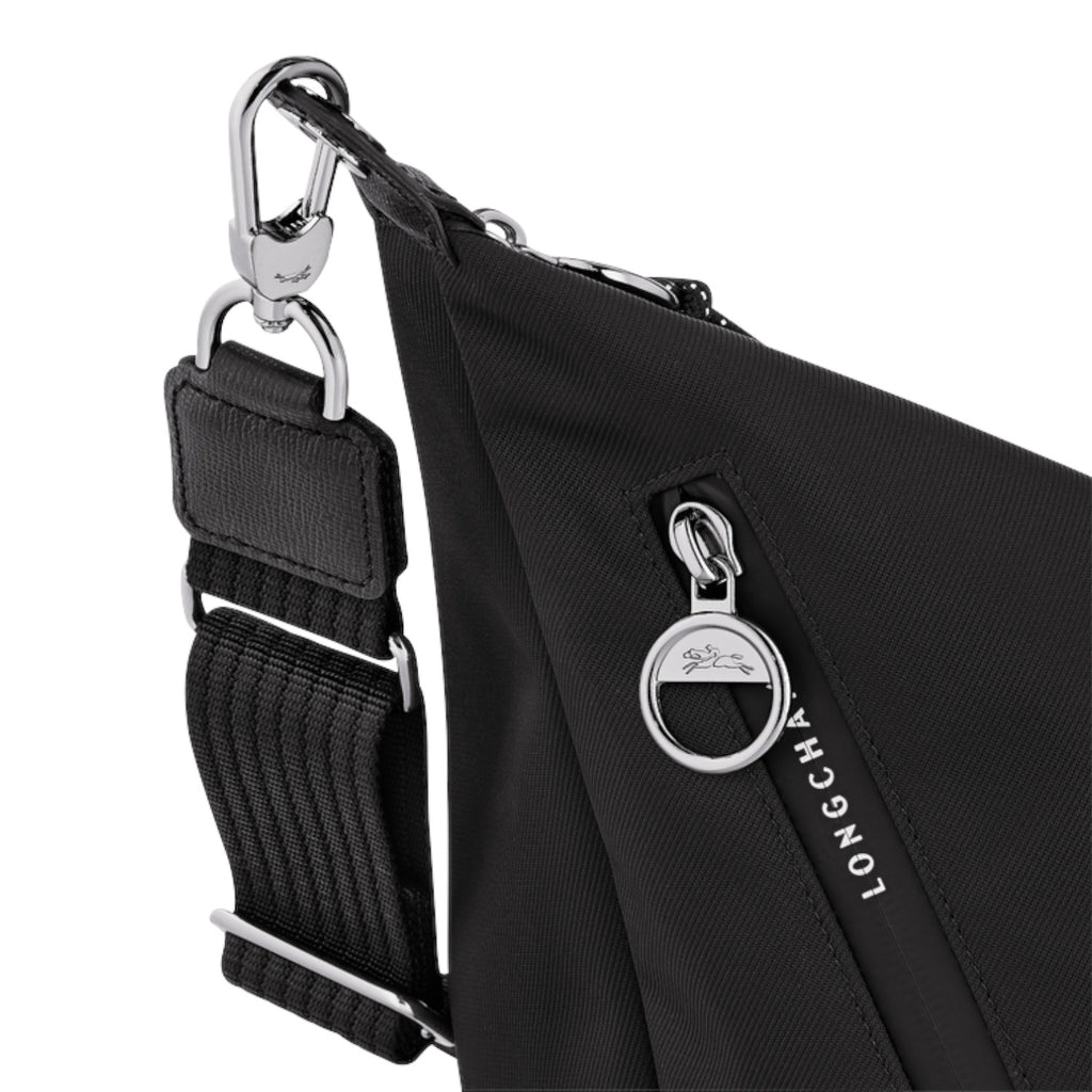 Lieblingstasche Le Pliage Energy black crossbody bag with silver hardware, adjustable strap, and zippered pocket.