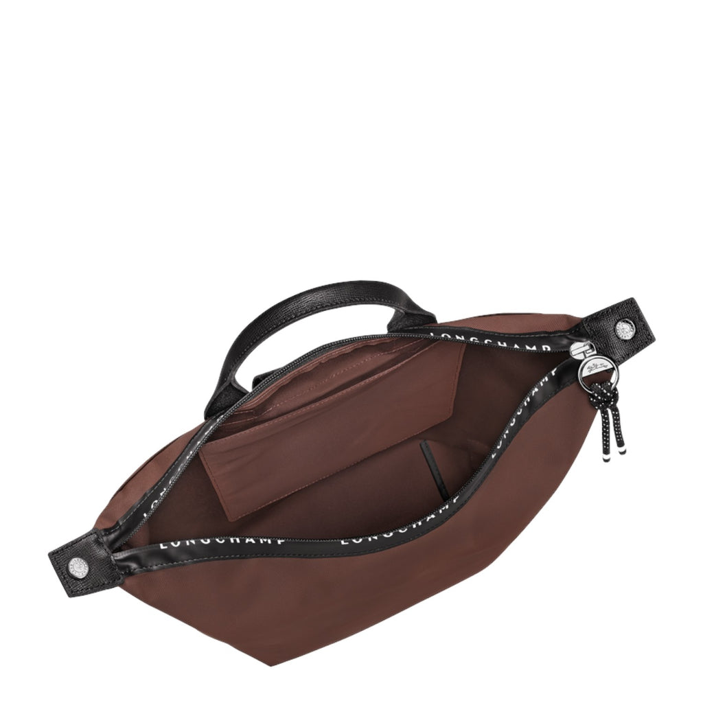 Lieblingstasche Le Pliage Energy Rucksack in brown nylon with black leather handles and zipper trim.