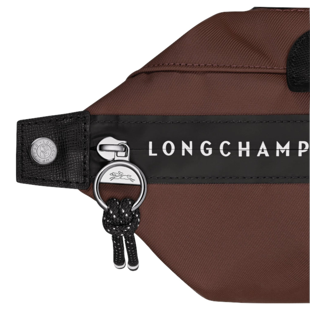 Lieblingstasche Le Pliage Energy Rucksack in brown nylon with black trim and silver hardware, featuring a zip closure and horse logo charm.