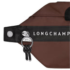 Lieblingstasche Le Pliage Energy Rucksack in brown nylon with black trim and silver hardware, featuring a zip closure and horse logo charm.