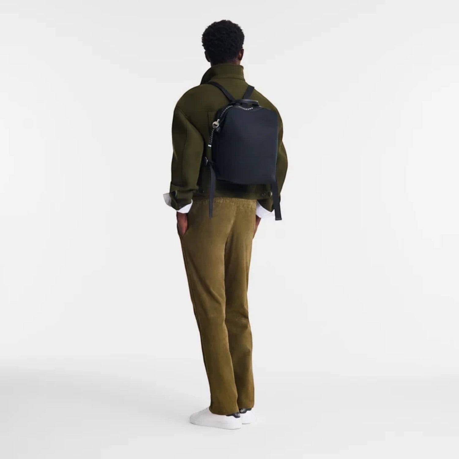 Lieblingstasche Le Pliage Energy Rucksack in navy recycled nylon with adjustable straps and minimalist design.