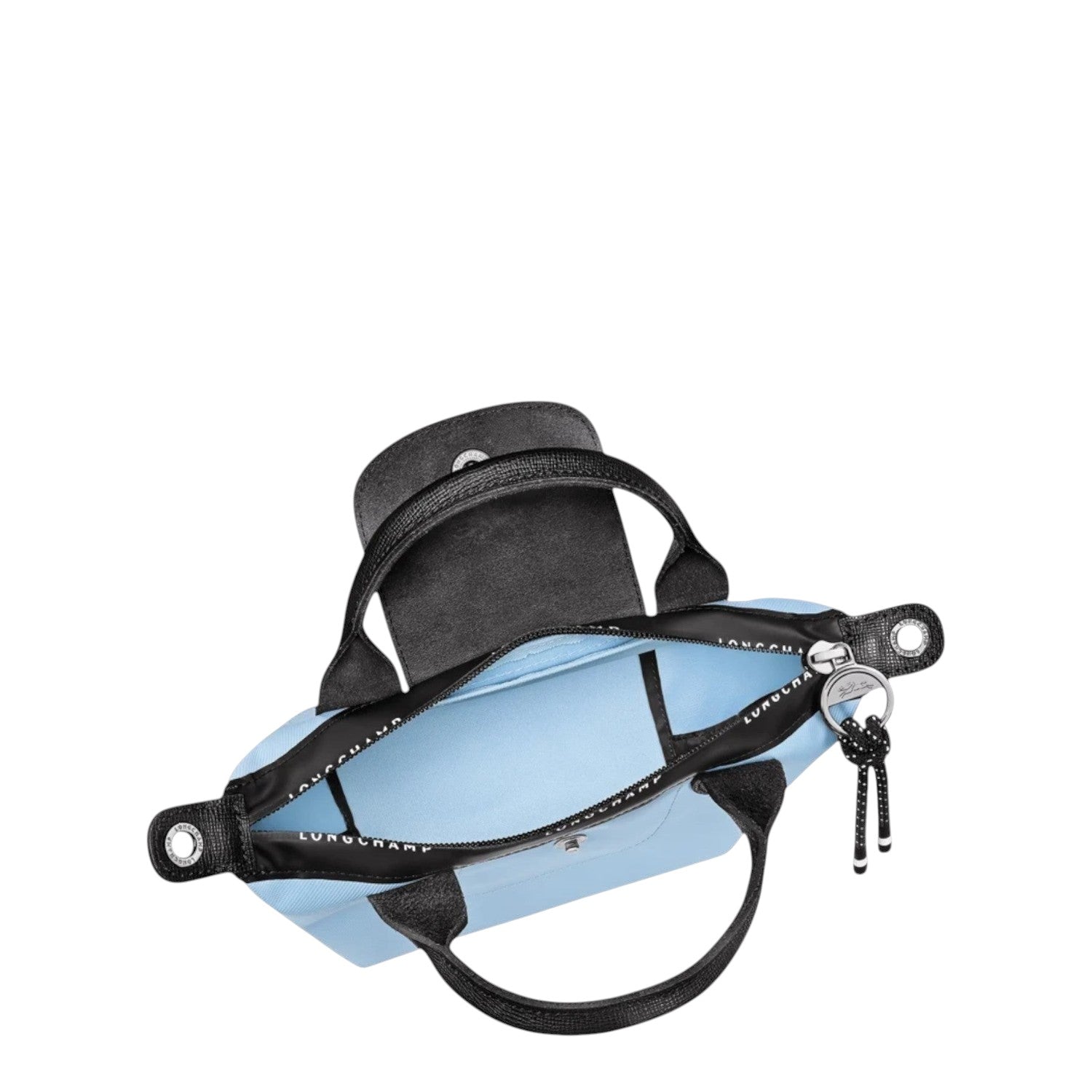 Lieblingstasche Le Pliage Energy XS handbag in light blue with black trim and handles, featuring a zip closure and a decorative rope charm.