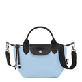 Lieblingstasche Le Pliage Energy XS handbag in light blue canvas with black leather trim and strap, featuring a top handle and snap closure.