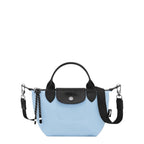 Lieblingstasche Le Pliage Energy XS handbag in light blue canvas with black leather trim and strap, featuring a top handle and snap closure.