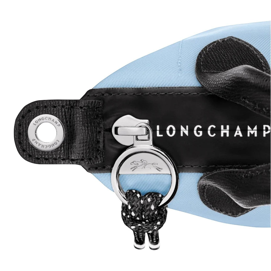 Lieblingstasche Le Pliage Energy XS handbag in light blue nylon with black leather trim and silver hardware.