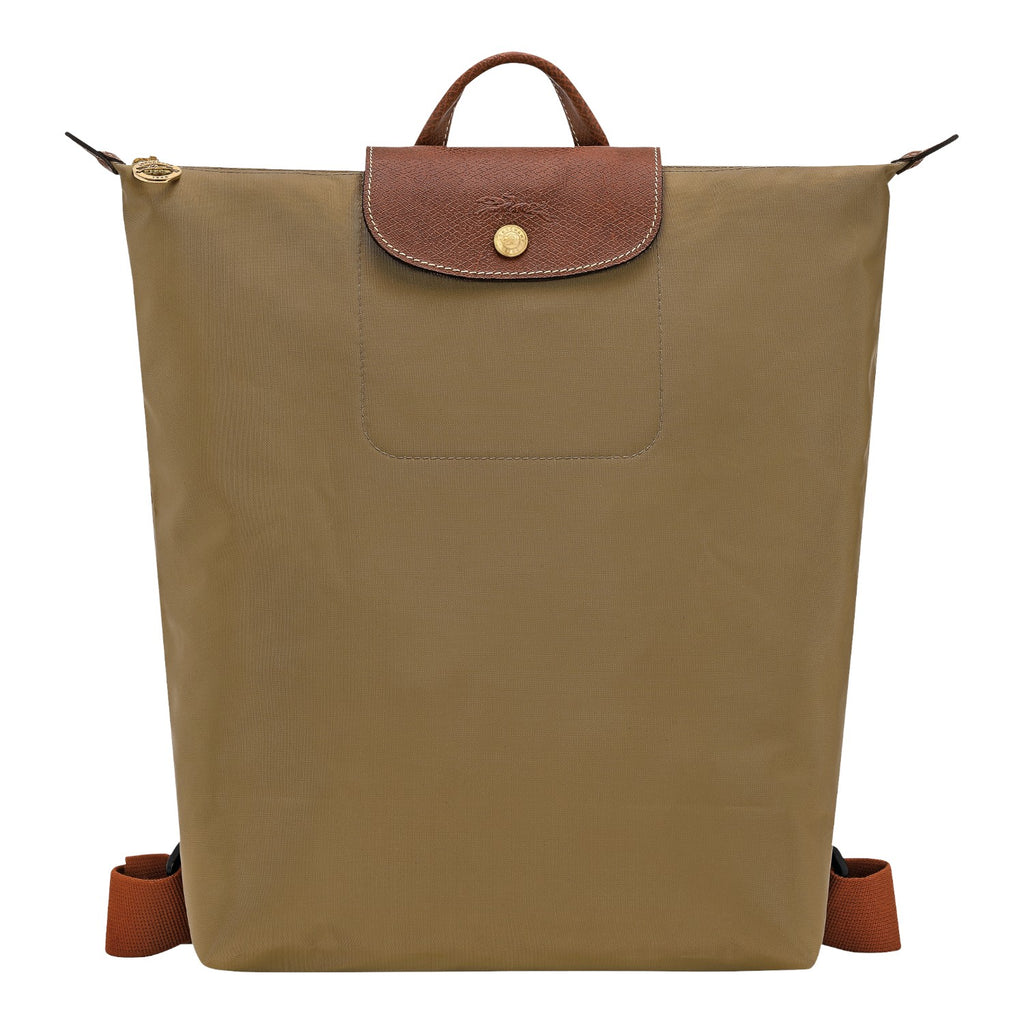 Lieblingstasche Le Pliage rucksack in khaki nylon with brown leather flap, gold snap button, and adjustable straps.