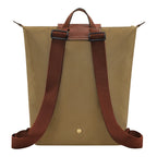 Lieblingstasche Le Pliage rucksack in khaki nylon with brown leather trim and adjustable canvas shoulder straps