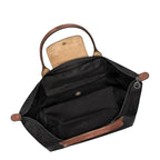 Lieblingstasche Le Pliage L black nylon tote bag with tan leather trim and handles, top zip closure.