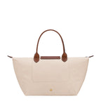 Lieblingstasche Le Pliage L cream nylon handbag with brown leather trim and handles.