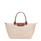 Lieblingstasche Le Pliage L cream nylon handbag with brown leather trim and handles.