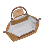Lieblingstasche Le Pliage L handbag in tan nylon with brown leather trim and handles.