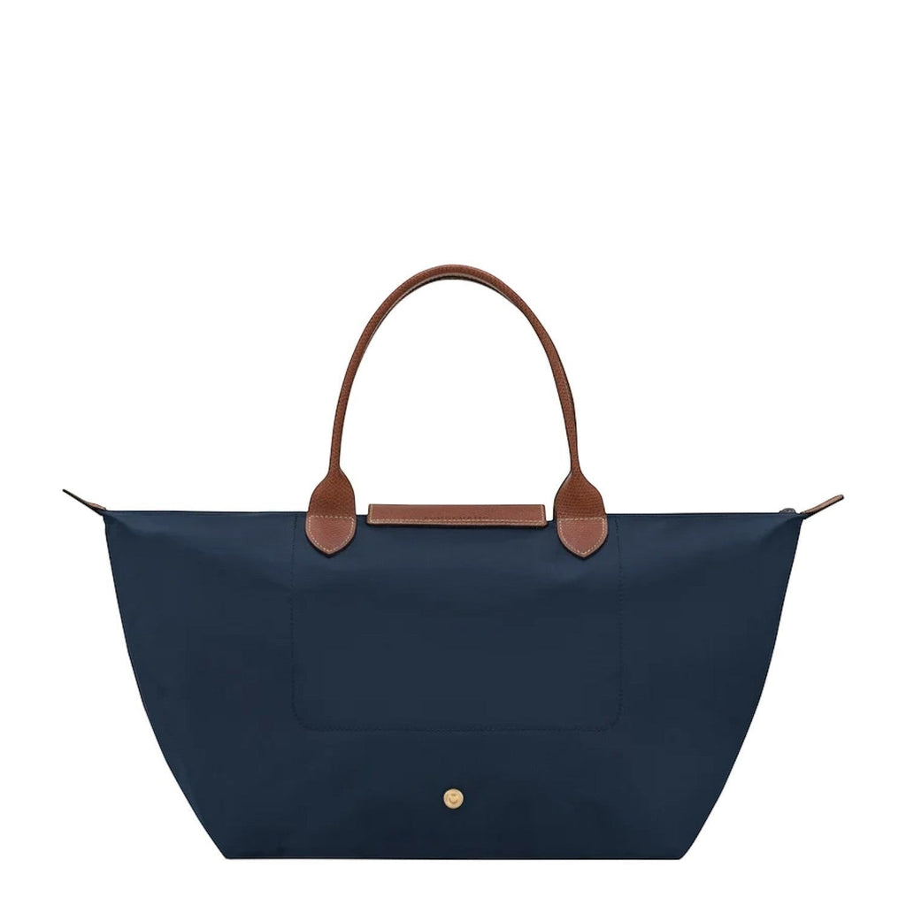 Lieblingstasche Le Pliage L navy nylon tote bag with brown leather handles and trim.
