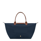 Lieblingstasche Le Pliage L navy nylon tote bag with brown leather handles and trim.