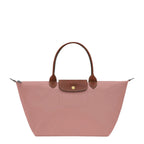 Lieblingstasche Le Pliage L pink nylon tote bag with brown leather trim and handles.
