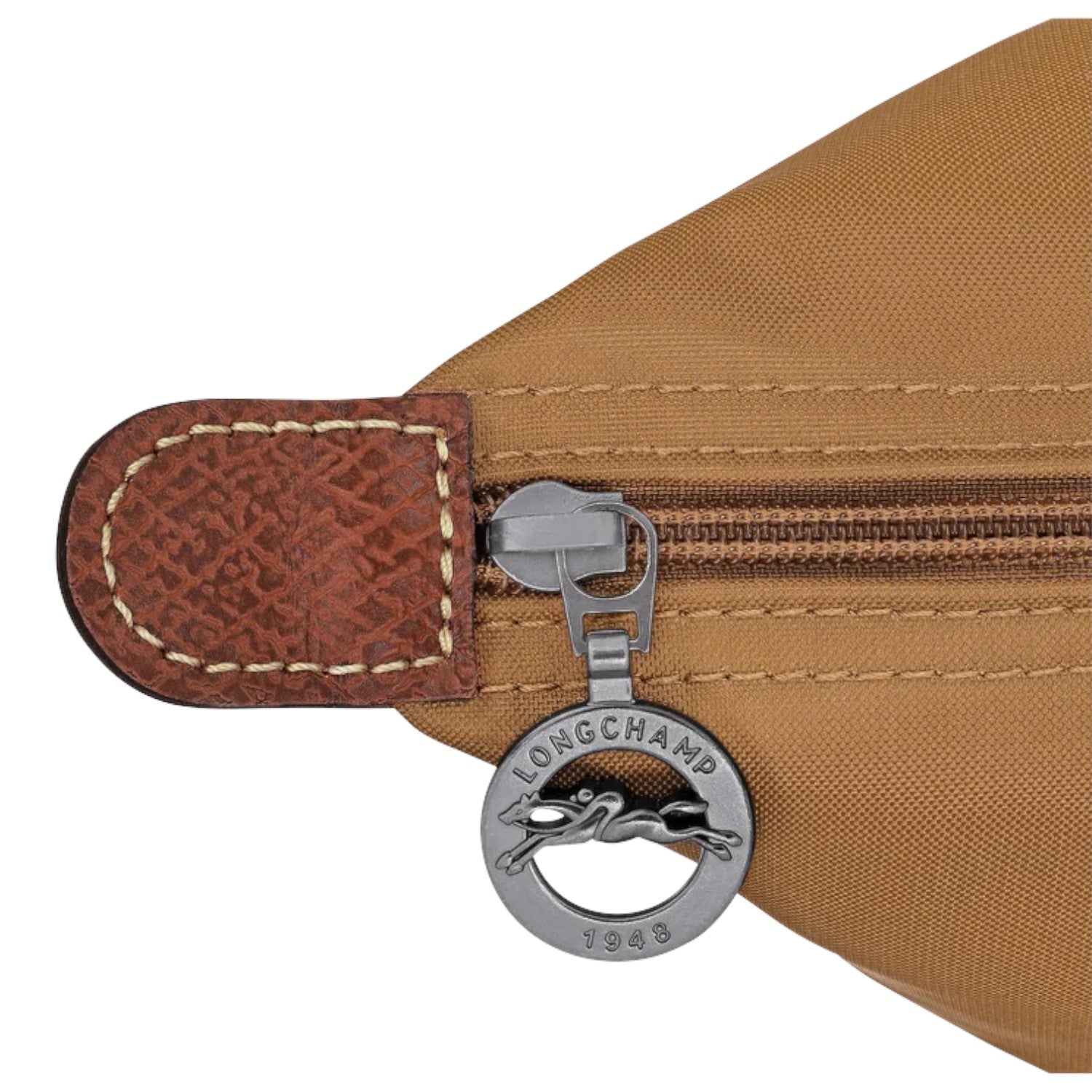 Lieblingstasche Le Pliage L handbag in tan nylon with leather trim and signature horse logo zipper pull.