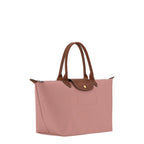 Lieblingstasche Le Pliage L tote bag in dusty rose nylon with brown leather handles and trim, featuring a snap closure.