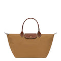 Lieblingstasche Le Pliage L tote bag in tan nylon with brown leather trim and handles.