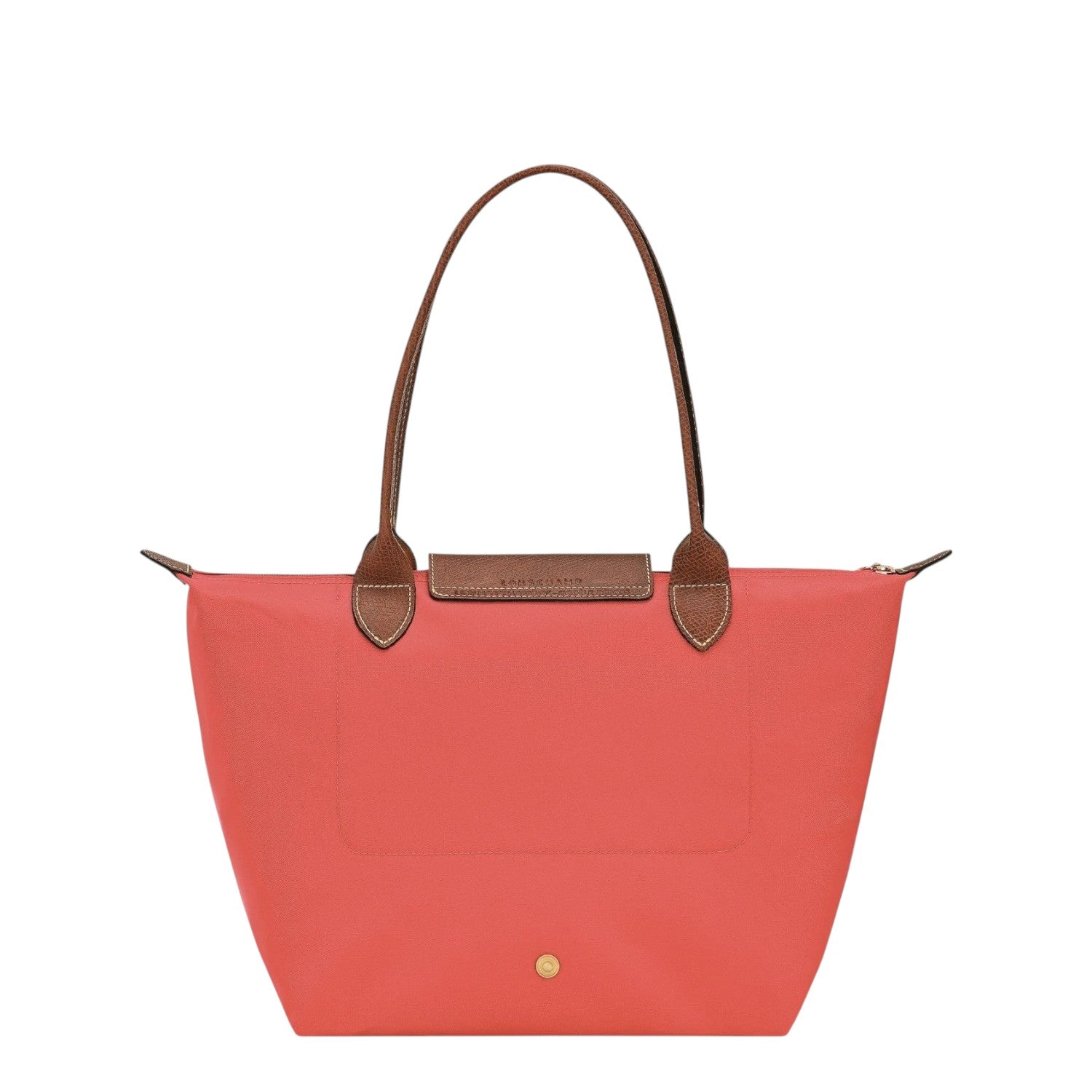 Lieblingstasche Le Pliage M tote bag in coral nylon with brown leather handles and trim.