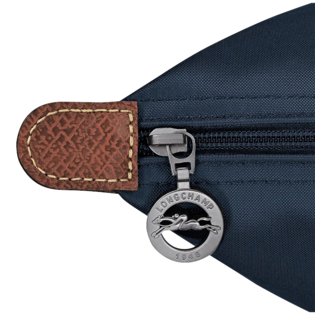 Lieblingstasche Le Pliage L navy nylon handbag with leather trim and signature horse logo zipper pull.