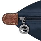 Lieblingstasche Le Pliage L navy nylon handbag with leather trim and signature horse logo zipper pull.