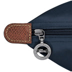 Lieblingstasche Le Pliage L navy nylon handbag with leather trim and signature horse logo zipper pull.