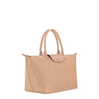 Lieblingstasche Le Pliage One large beige nylon tote bag with leather trim and snap closure.