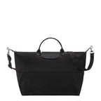 Lieblingstasche Le Pliage One black nylon travel bag with leather trim and adjustable strap.