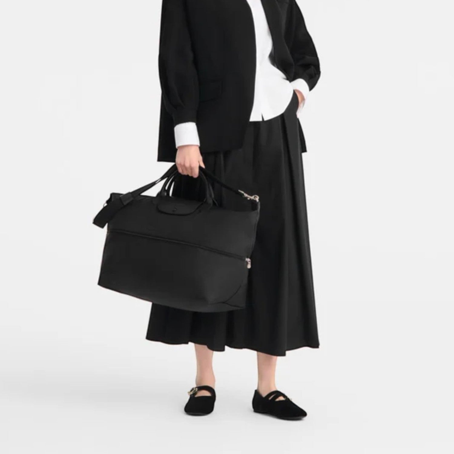 Lieblingstasche Le Pliage One black nylon travel bag with leather trim and shoulder strap