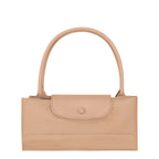 Lieblingstasche Le Pliage One handbag in beige nylon and leather with a snap closure.
