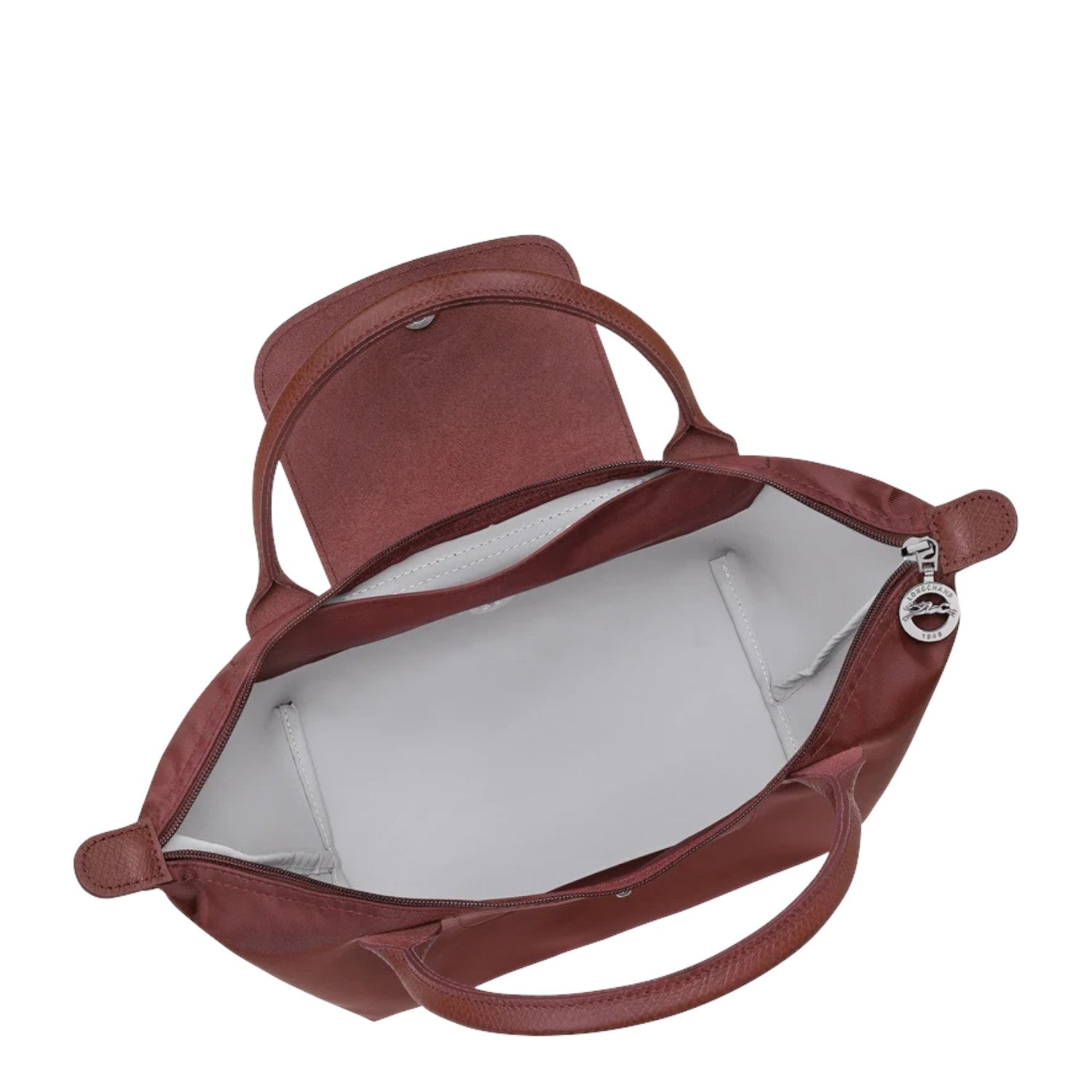 Lieblingstasche Le Pliage One handbag in burgundy nylon with leather trim and silver hardware.