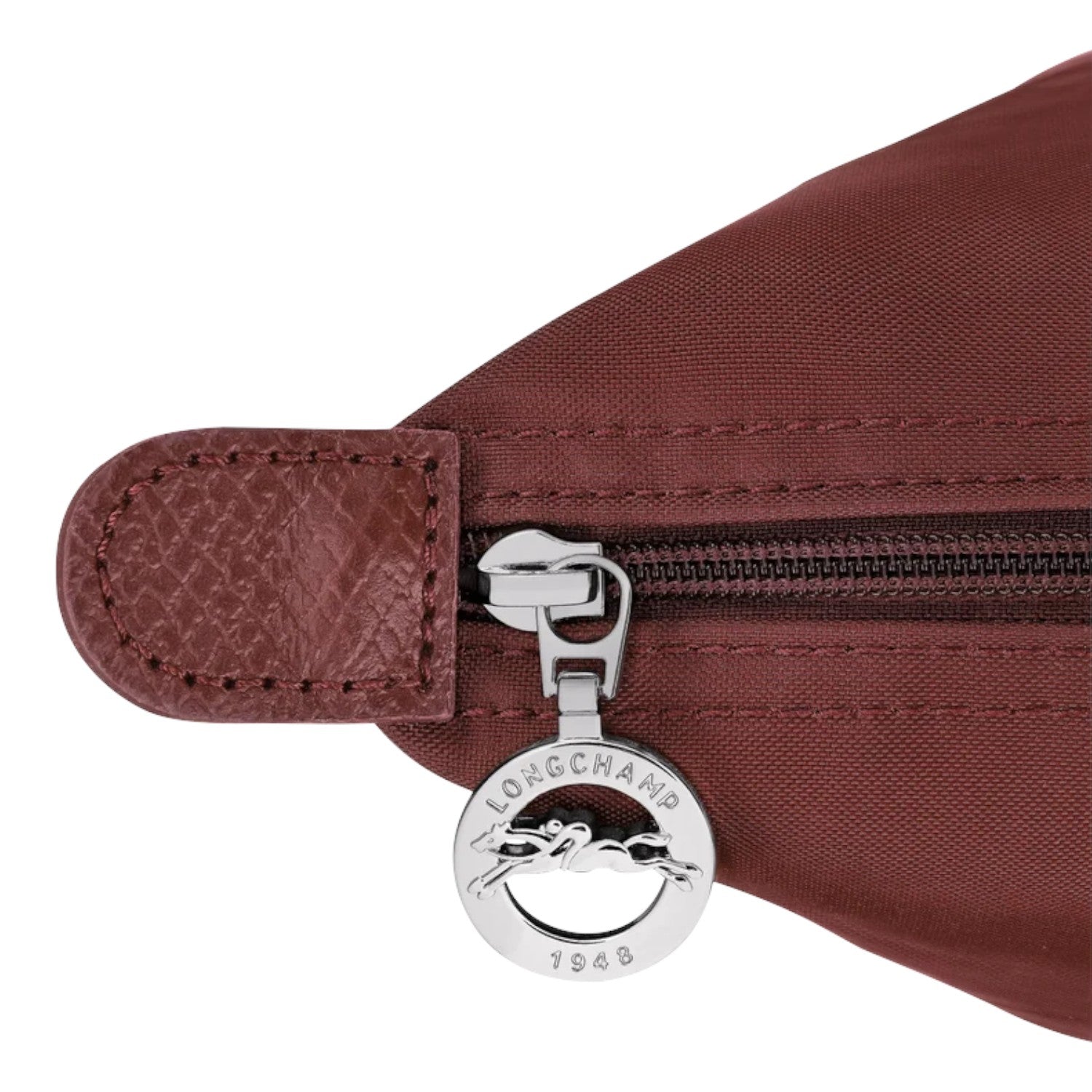 Lieblingstasche Le Pliage One handbag in burgundy nylon with leather trim and silver hardware.