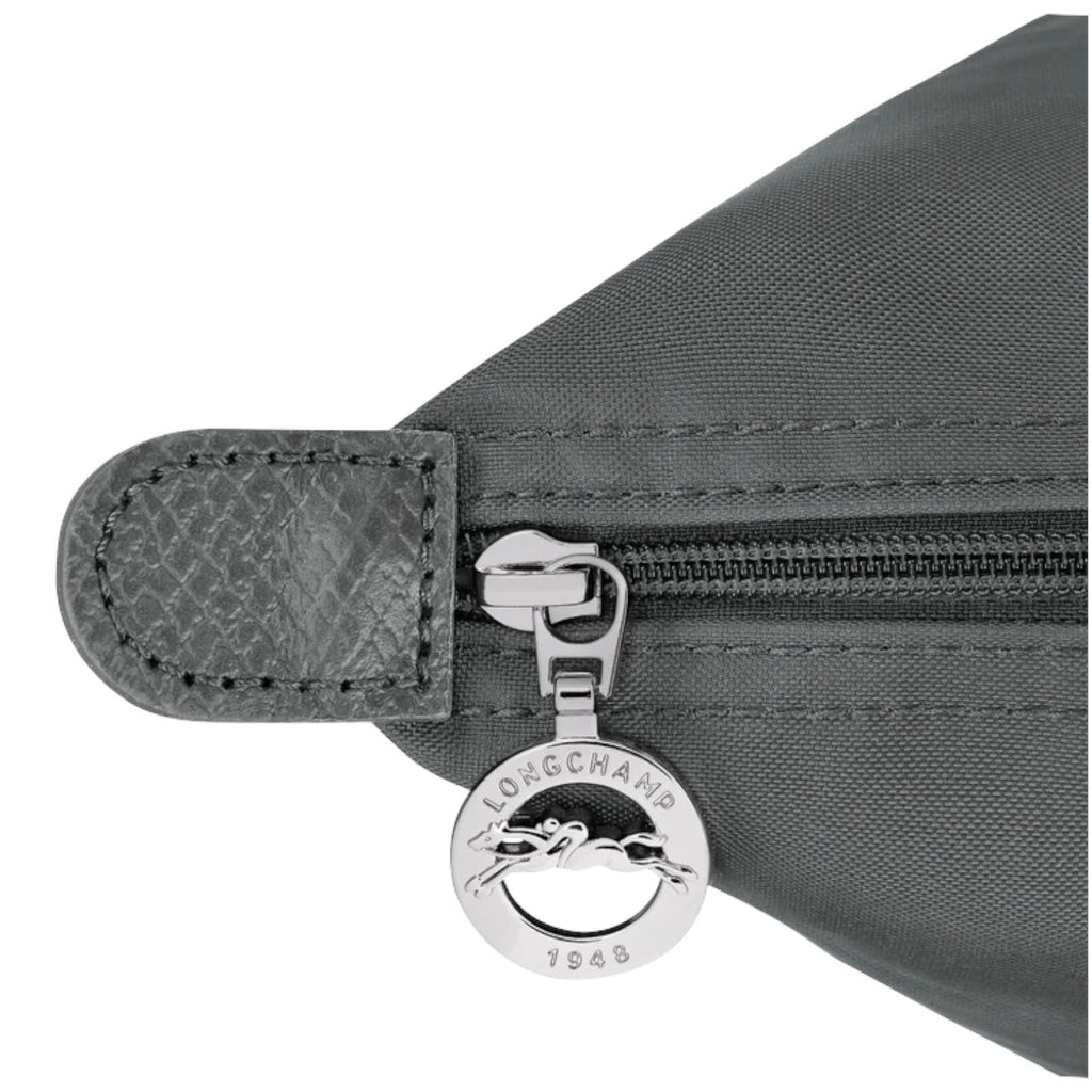 Lieblingstasche Le Pliage One handbag in grey nylon with leather trim and a silver zipper pull featuring the Longchamp logo.