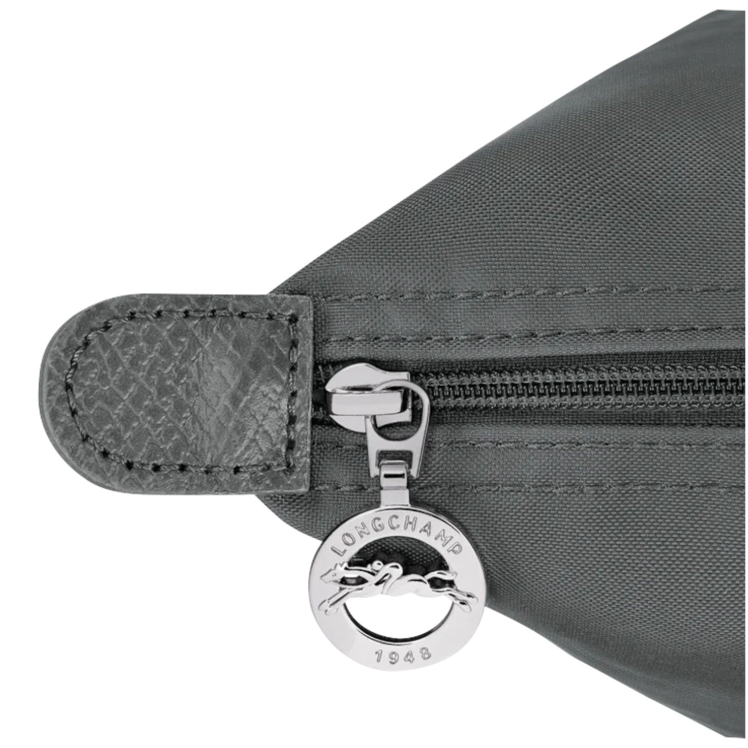 Lieblingstasche Le Pliage One handbag in grey nylon with leather trim and a silver zipper pull featuring the Longchamp logo.