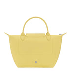 Lieblingstasche Le Pliage One handbag in yellow leather with top handles and a snap closure.