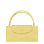 Lieblingstasche Le Pliage One handbag in light yellow nylon with leather trim and snap closure.