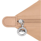 Lieblingstasche Le Pliage One Handtasche L in beige nylon with leather trim and silver horse logo zipper pull.