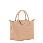 Lieblingstasche Le Pliage One Handtasche S in beige leather with a flap closure and top handles.